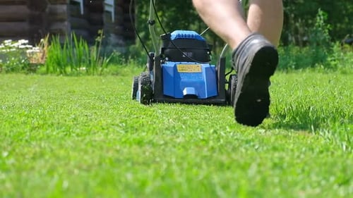 Lawn Mower Cutting Grass Small Grass Cuttings Fly Out of Lawnmower Grass Clippings Get Spewed Out of