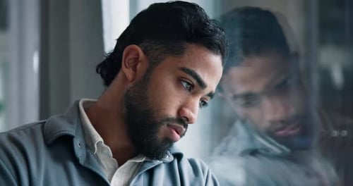 Depressed, thinking and business man by window with stress for failure, job loss and bankruptcy