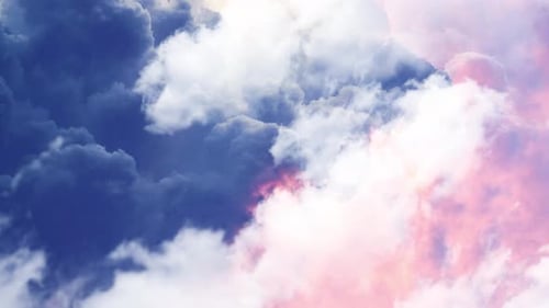 thick gray and orange cumulus clouds in the sky with a thunderstorm