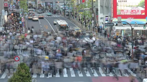 Tokyo, Japan Circa-2018. Time Lapse Shot Of Cars And People Crossing Street At Shibuya Crossing I...