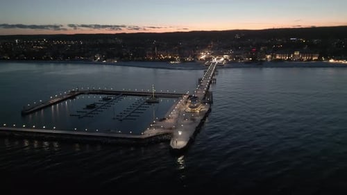 Revealing scenic panorama of Sopot pier at winter sunset, aerial