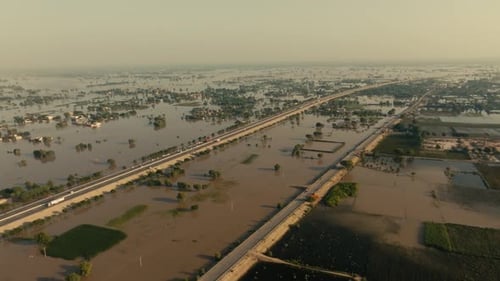 aerial - motorway surrounded by floods Jalalpur Pirwala Punjab Pakistan 2025
