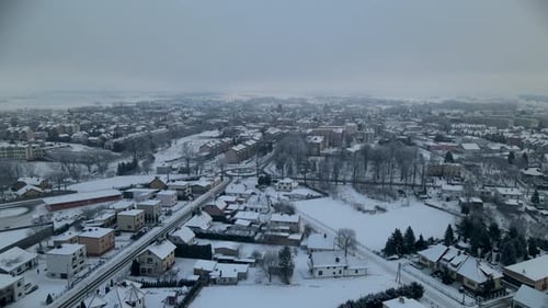 Aerial footage Lubawa city in Poland east Europe winter landscape cityscape covered white fresh snow