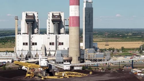 Drone Shot of Coal Power Plant, Building and Chimney on Sunny Summer Day