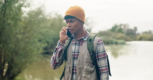 Hiking, phone call and man with connection problem in a forest for signal