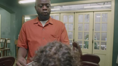 Barber Using Hair Clippers and Doing Haircut in Salon