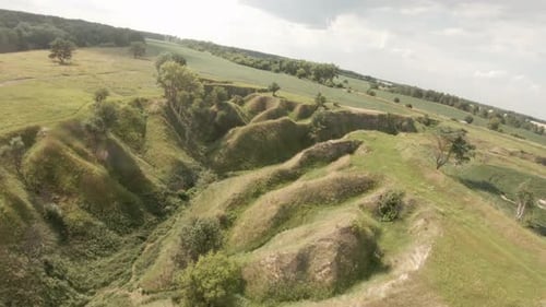 Cinematic Drone Flying Over the Grass Canyon in Nature