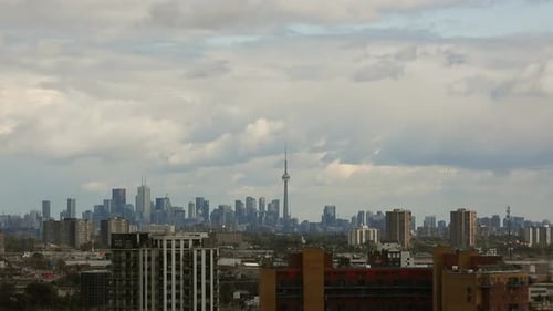 Timelapse of Toronto skyline on a cloudy overcast day. View from urban city
