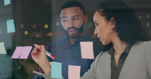 Collaboration, brainstorming or business people writing on board in a marketing agency office