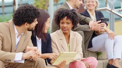 Business Multiethnic People Financial Business People Having a Meeting Using Digital Tablet