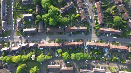 4K aerial shot of typical British houses from above in the morning and housing crisis