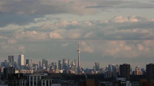 Spectacular cityscape timelapse of Ontario with clouds building casting a shadow over the city build