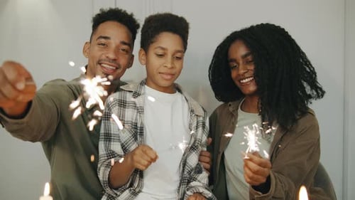 A Joyful Family Comes Together to Celebrate Christmas or New Year with Festive Dinner Joyfully
