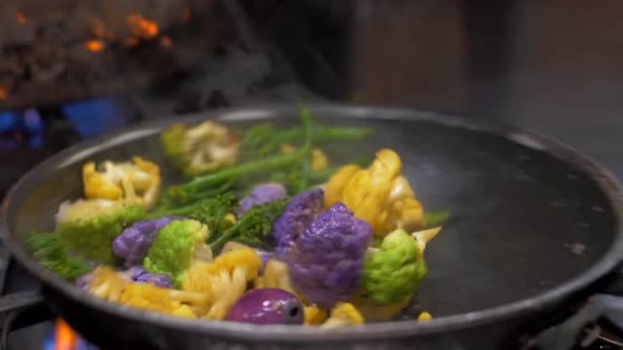 Cover for Colorful Vegetables Cooking in Skillet Appetizer