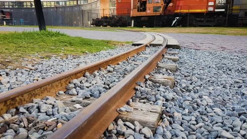 Old rusty train tracks for a miniature train