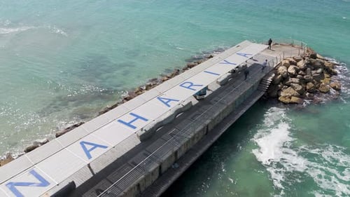 Aerial view of Nahariya Pier, Israel.