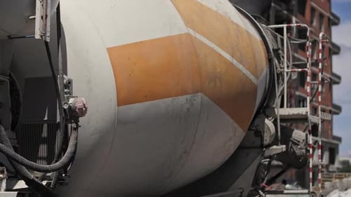 Concrete Mixer Truck Spinning at a Construction Site