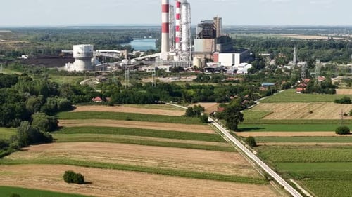Revealing Drone Shot of Coal Fired Power Plant, Landscape and Smoke From Chimney