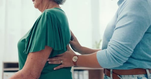 Hands of woman, back pain or physiotherapy for patient with help in physical therapy rehabilitation