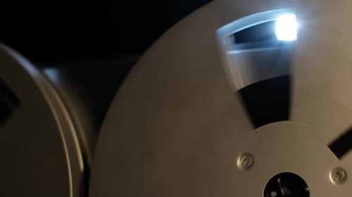 Rotating ReeltoReel Spools with Illuminated Motion