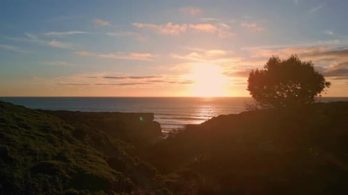 Aerial View Amazing Evening Seascape Grassy Hills Shore Water Rippling Surface