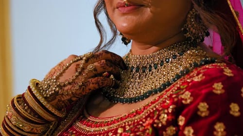 Bride Dressed in Traditional Red Indian Clothes with Beautiful Neckless on Her Neck Elements of