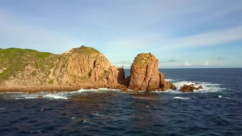 Aerial shot of a Mountain beach in Australia