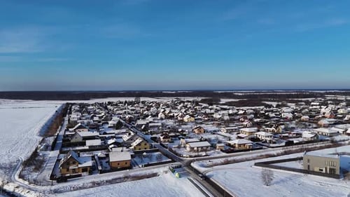 Cinematic drone shot of city of Silute living society landscape in winter, Lithuania