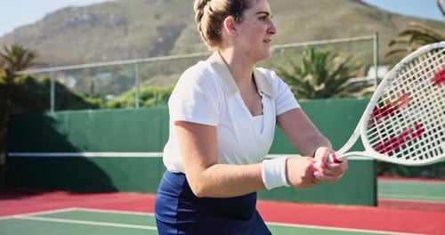 Woman, tennis and court with celebration, energy and training with sunshine, exercise and winning