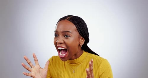 Angry, stress and face of black woman screaming in studio with anxiety, mistake