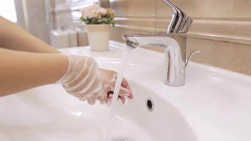 Boy Washing Hands with Soap