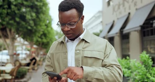 Business, city and black man with phone call, stress and internet with weak connection