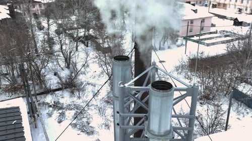 White Smoke and Fumes Coming Out of Metal Pipes with Grid