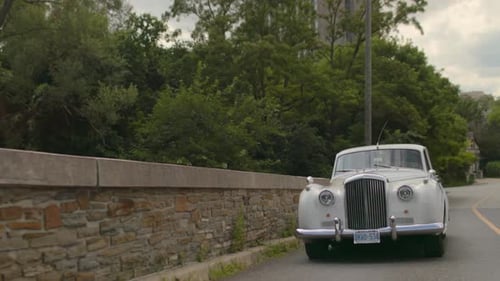 Classic White Rolls Royce car on the road, Cinematic Footage