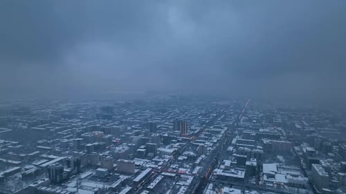 Aerial View of Bishkek City in Winter Snow and Fog