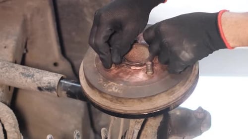 The Mechanic Checks the Chassis for Any Damage or Wear Car Undercarriage Repair Vertical Video