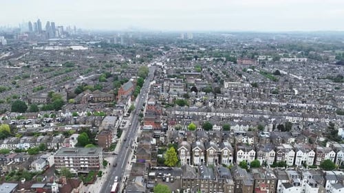 Ascending above South West London with the city skyline in the distance