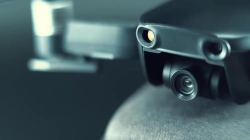 Drone Camera Lens on a stabilizer, propellers and sensors, aerial photography gear, professional fil