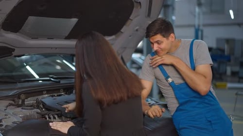 Rude Man Rubbing Chin Rolling Eyes Listening to Woman Talking in Slow Motion Examining Car Engine
