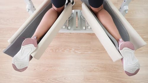 Physiotherapist Working Injury Recovery Female Athlete Using Exercise Equipment