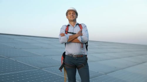 Maintenance assistance technical worker in uniform is smiling in camera satisfied with his work af