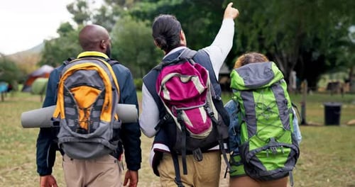 Hiking, people pointing and backpack in nature with view and walking on travel and holiday