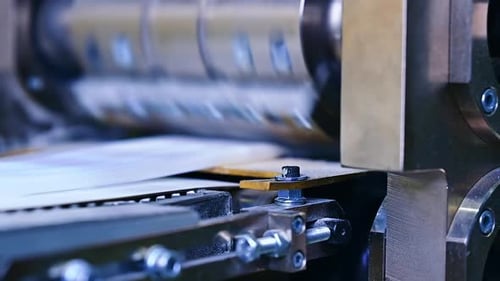 Strong bolts and internal screws holding a construction of a machine for producing diapers.