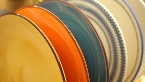 Colorful Dishes Arranged Neatly on Display in a Kitchen