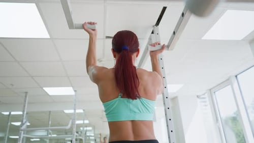 Woman Recovering From Injury with Help Physiotherapy in Special Equipment