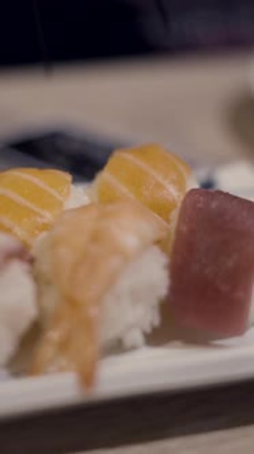 Table Setting for Dinner at Asian Restaurant Glasses and Ceramic Tableware Close Up Slider