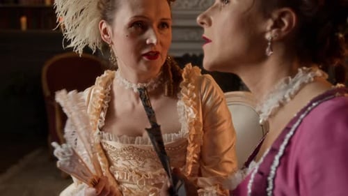 Two 18th Century Noblewomen Chatting while Sitting Together at Party