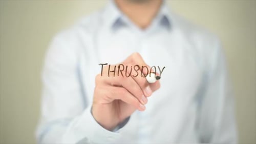Man Writing on Transparent Screen
