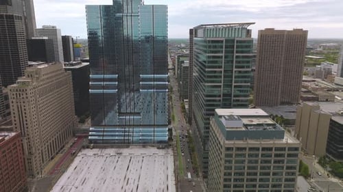 Cars moving along the roads of Chicago among the skyscrapers. Wonderful architecture of metropolis