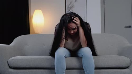 Sad Hopeless Young Woman Sit Alone at Home Feeling Desperate Depressed Upset Stressed Girl Suffer